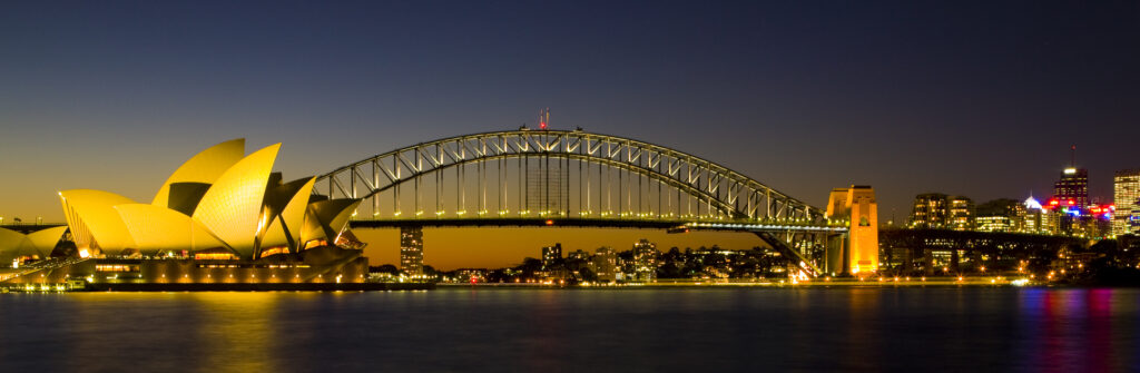 Sydney Harbour bridge and the opera house viewed at dusk.