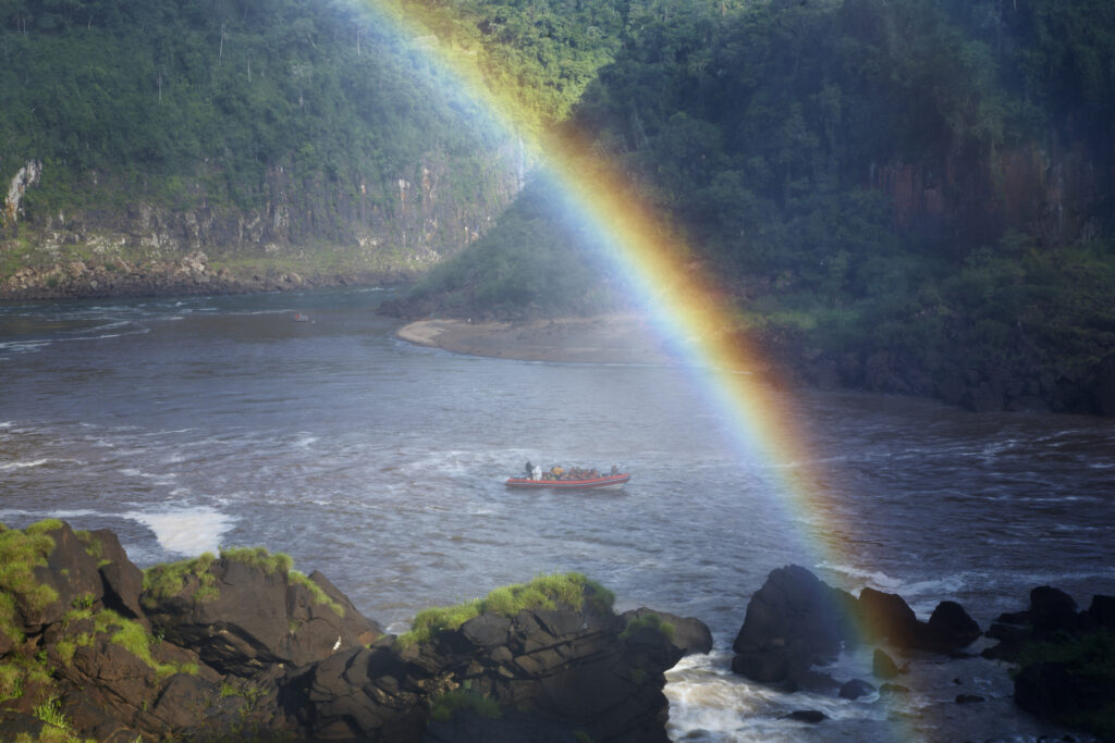Argentina, Misiones, Iguazu National Park. Rainbow near the impressive Iguazu waterfalls – A world heritage site.